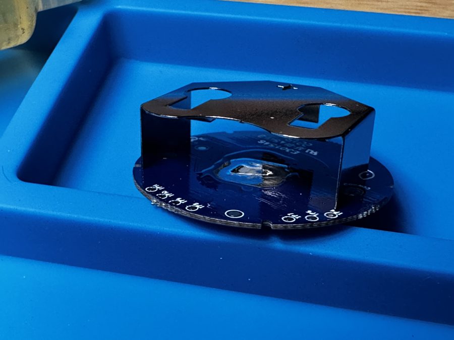 The XA122 center battery pad tinned with a thin layer of solder